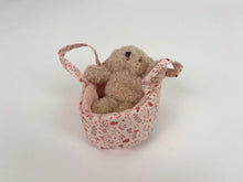 Mini Morris in a Carry Cot