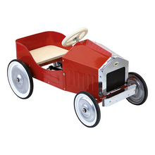 Large red pedal car